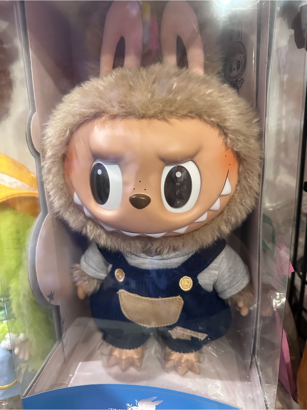 Plush Monster Doll in Brown Fur with Blue Overalls - Kids Toy